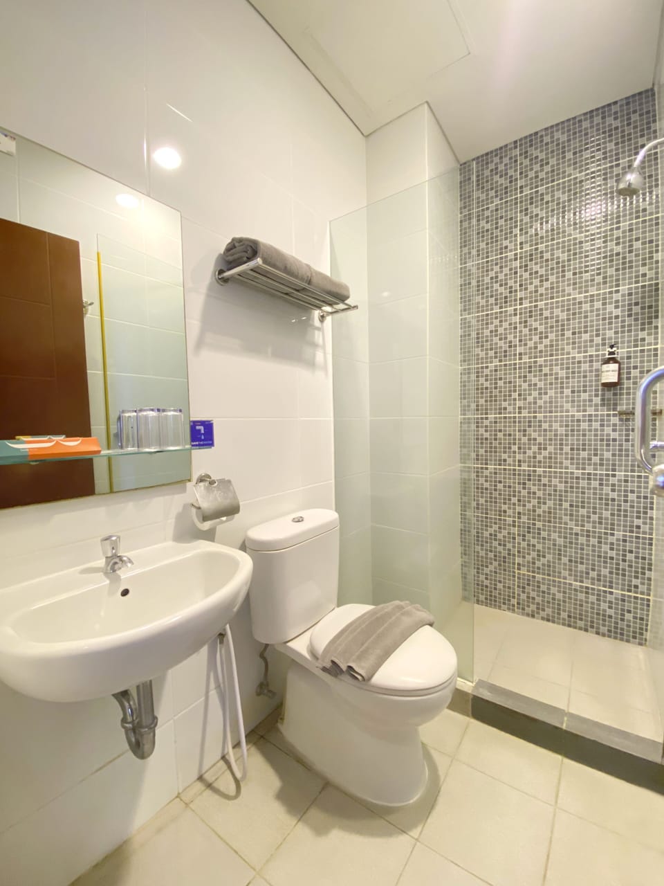 Shower, free toiletries, hair dryer, slippers