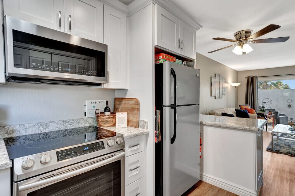 Kitchen, fire extinguisher, and board games.