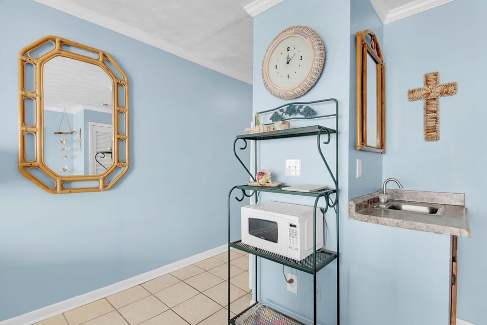 Microwave next to kitchenette