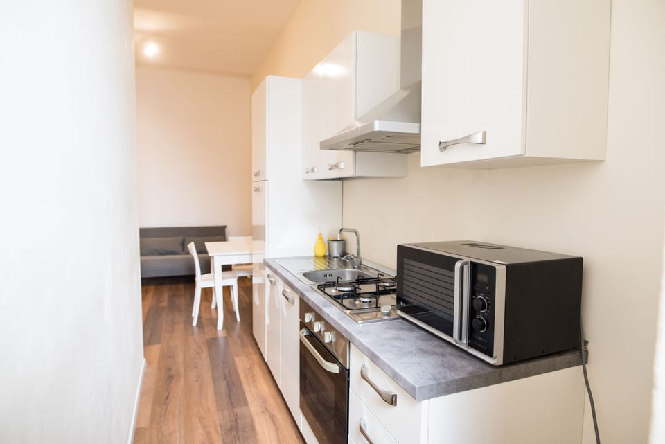Grand Triple Room | Private kitchen | Espresso maker, coffee/tea maker, electric kettle