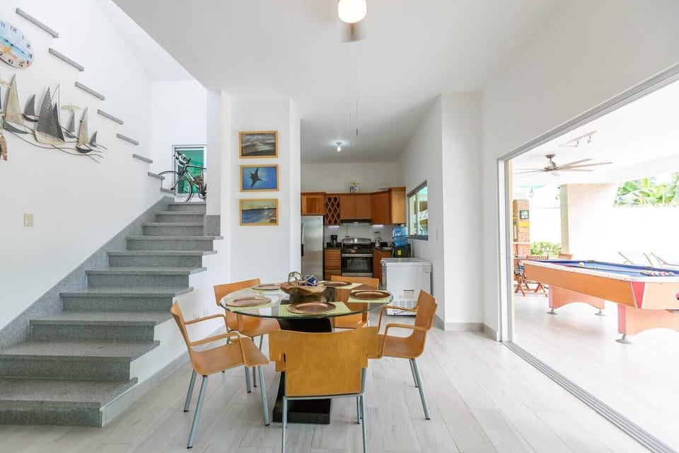 Second story is not available for guest. ( Is just under construction).

Dining room table for 4, living room has access to the kitchen and exterior area. 