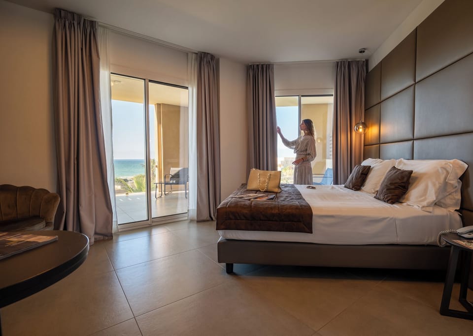 Premium bedding, down comforters, memory foam beds, free minibar