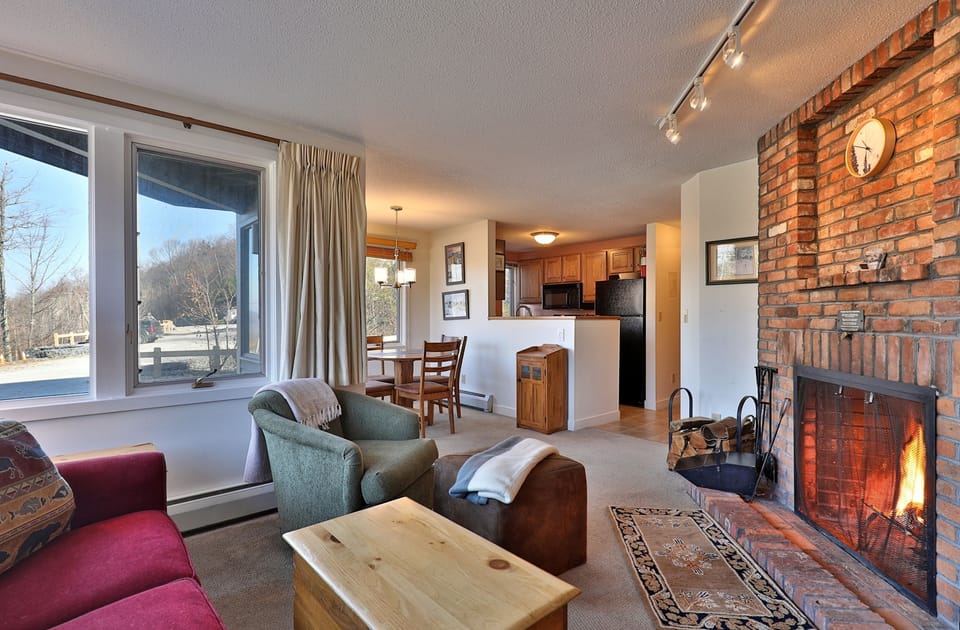 Open plan view of living, dining, and kitchen area