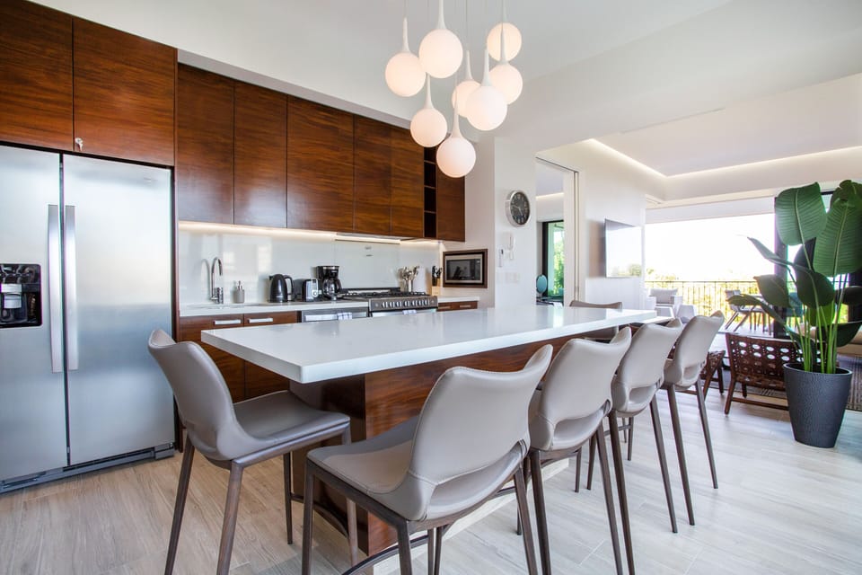 Kitchen bar with high chairs to enjoy meals