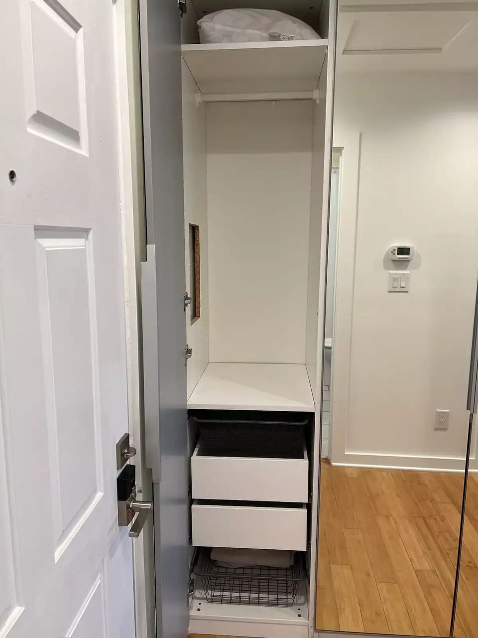 Secondary closet with hangers and drawers
