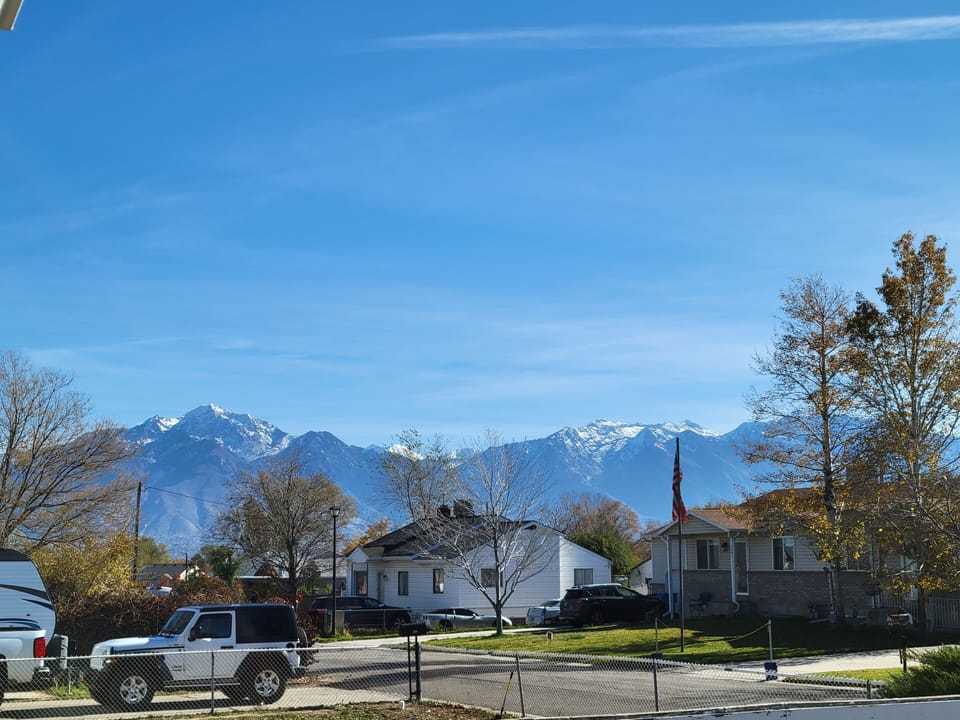 Views of Big & Little Cottonwood Canyons and the Wasatch Mountains.
