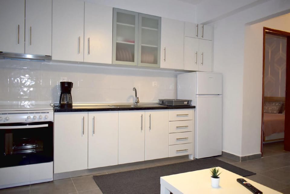 Apartment | Private kitchen | Fridge, oven, stovetop, electric kettle