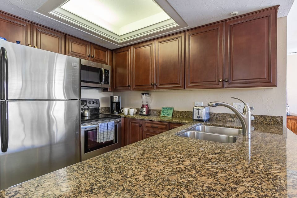 Updated kitchen with stainless appliances and granite counters.  Includes all basic cooking essentials…dishes, glasses etc.