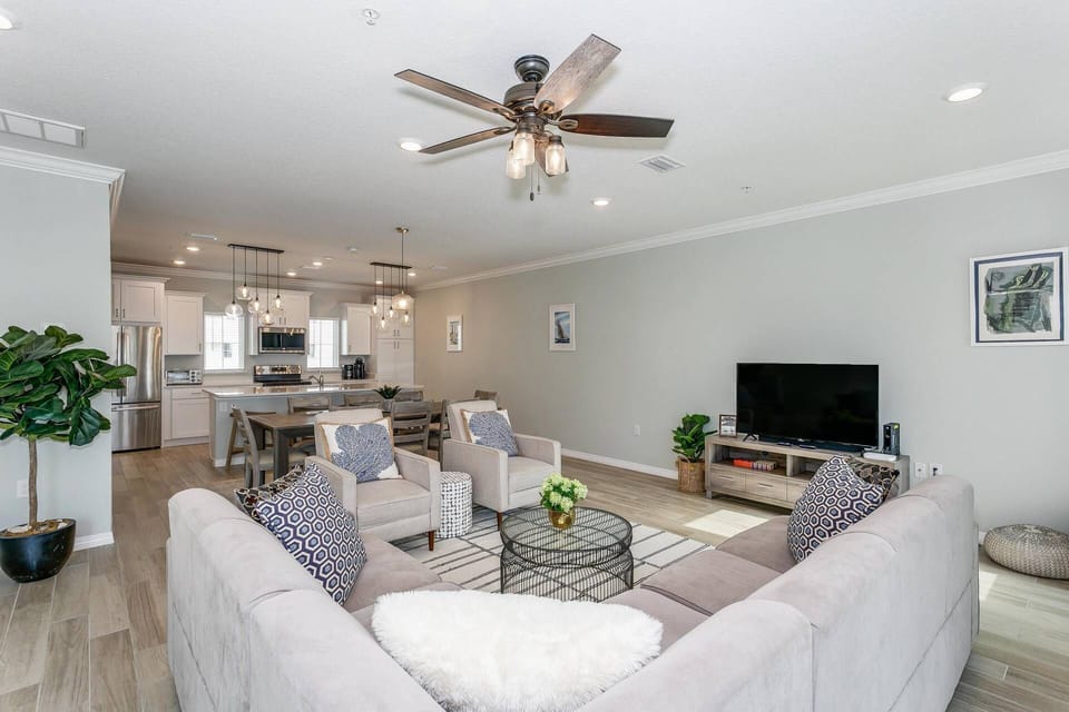 Open concept living, dining and kitchen provides space for the entire family