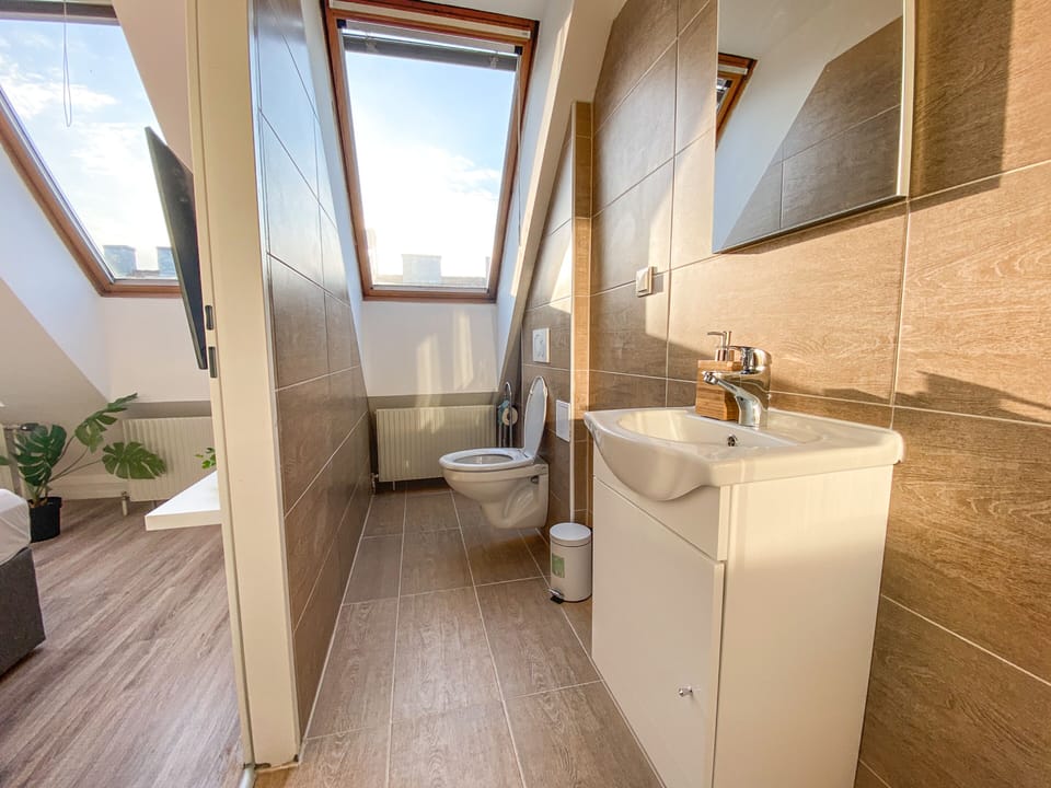 Raised toilet seat