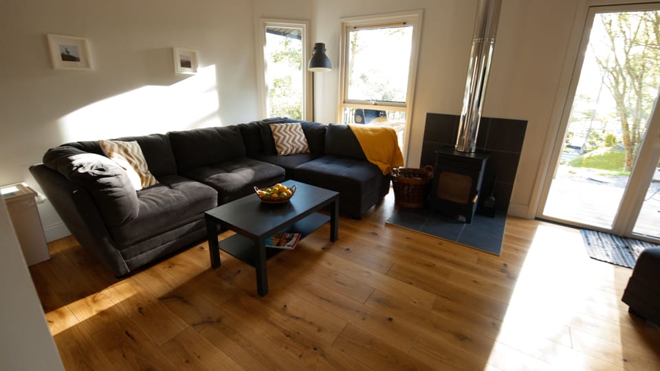 Comfort Chalet | Living area | 60-inch Smart TV with satellite channels, TV, Netflix