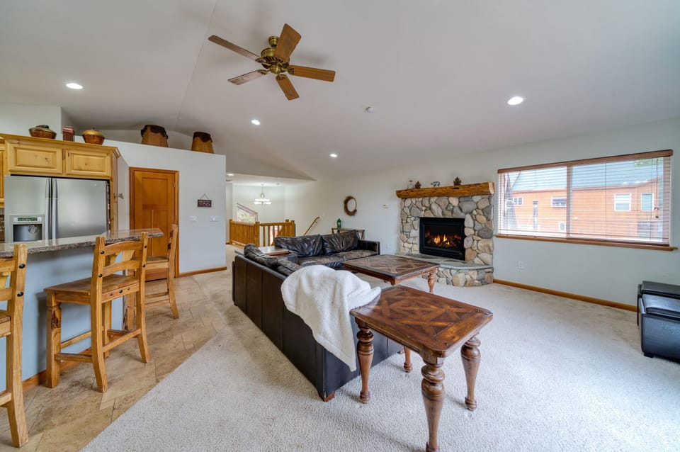 Open Spacious living area - gas fireplace with comfortable leather chairs

