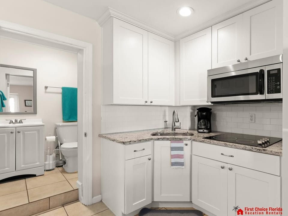 Bright, modern kitchen with sleek appliances and ample storage