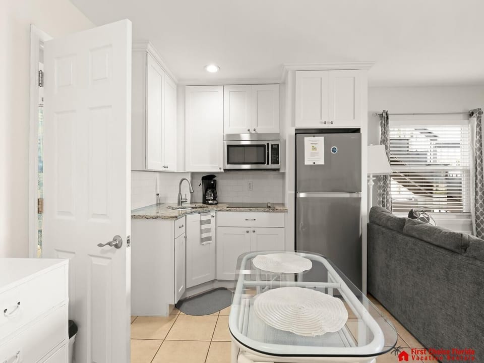 Bright, modern kitchen with cozy adjacent living area