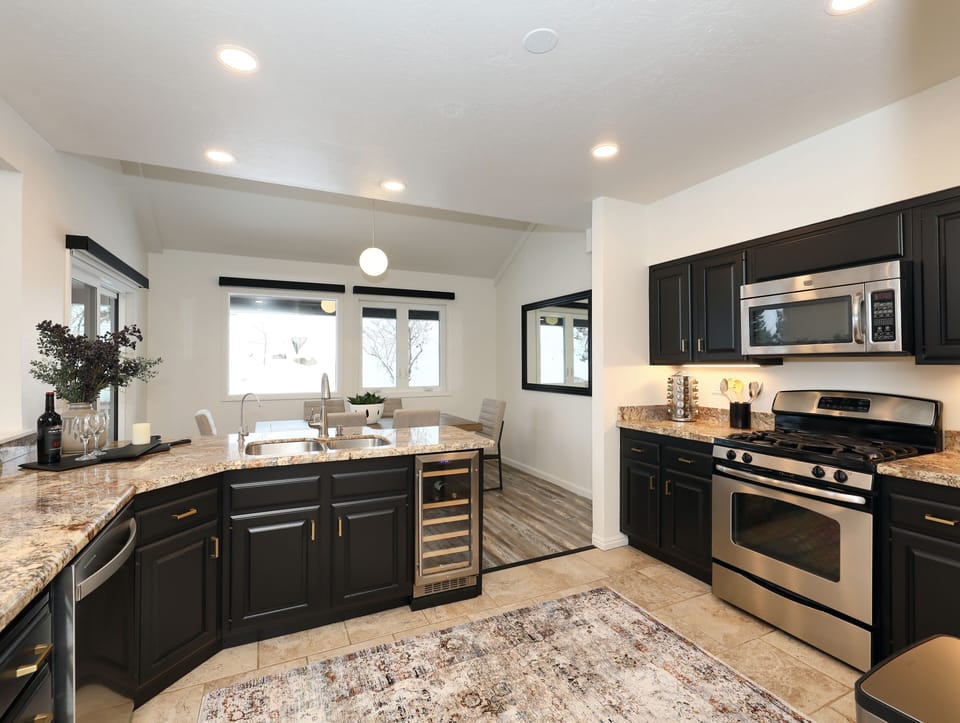 Brand new fridge, dishwasher and other appliances with all the kitchen amenities