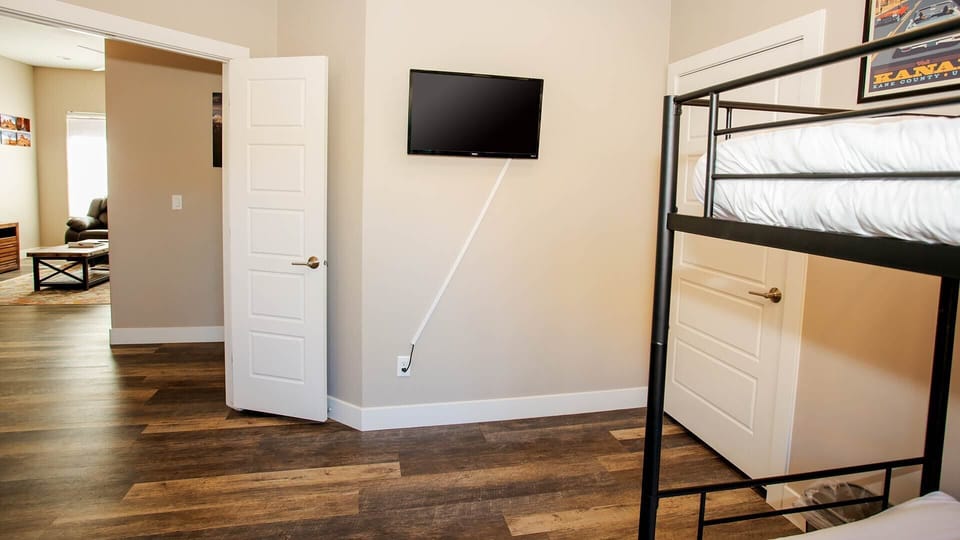 Drift off to dreamland after catching up on your favorite shows on the TV in the second guest bedroom.