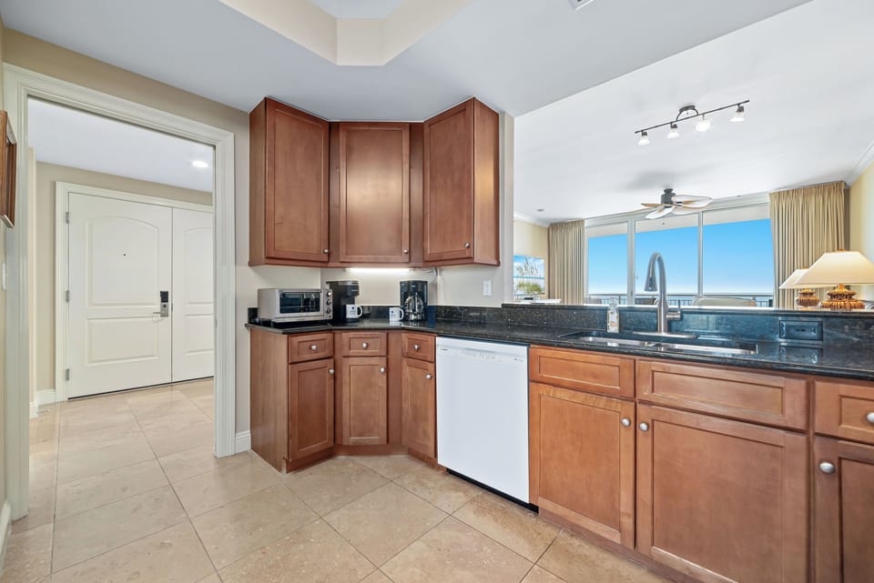 Guests love the "open feel" of our well-appointed kitchens with Gulf views