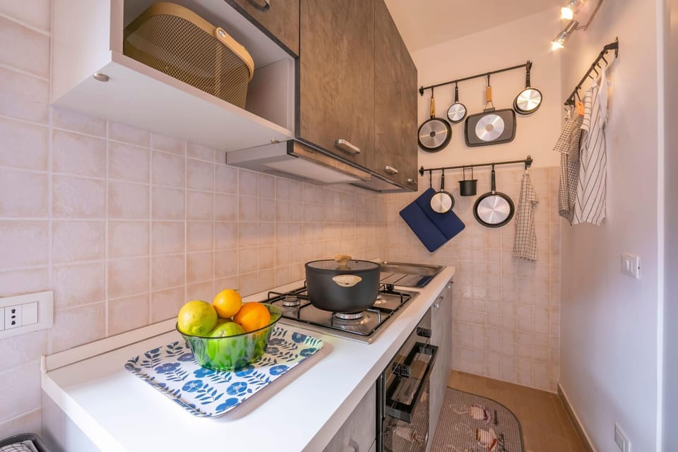 Family Apartment, 2 Bedrooms, Balcony (Sicilian Charm close to Taormina) | Private kitchen | Dining tables