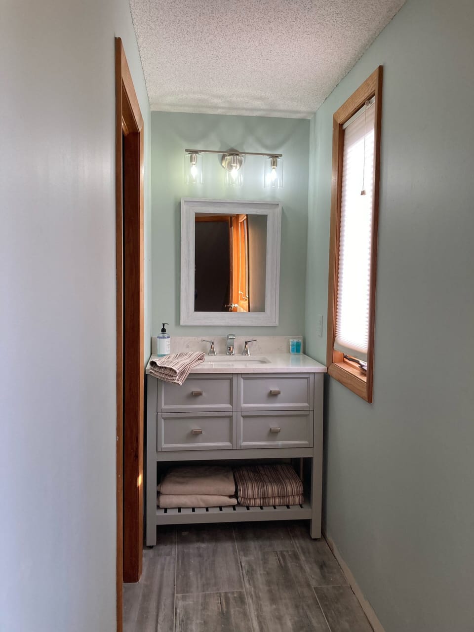 New tile floor and vanity (master bathroom)