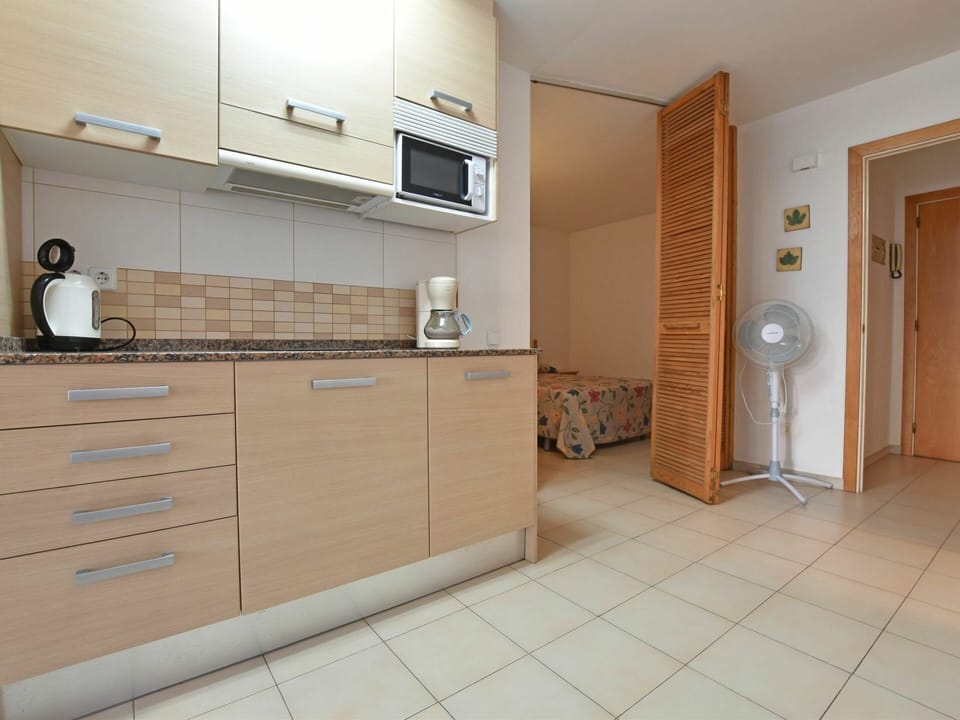 Property, Cabinetry, Furniture, Building, Countertop, Door, Wood, Interior Design, Drawer, Flooring