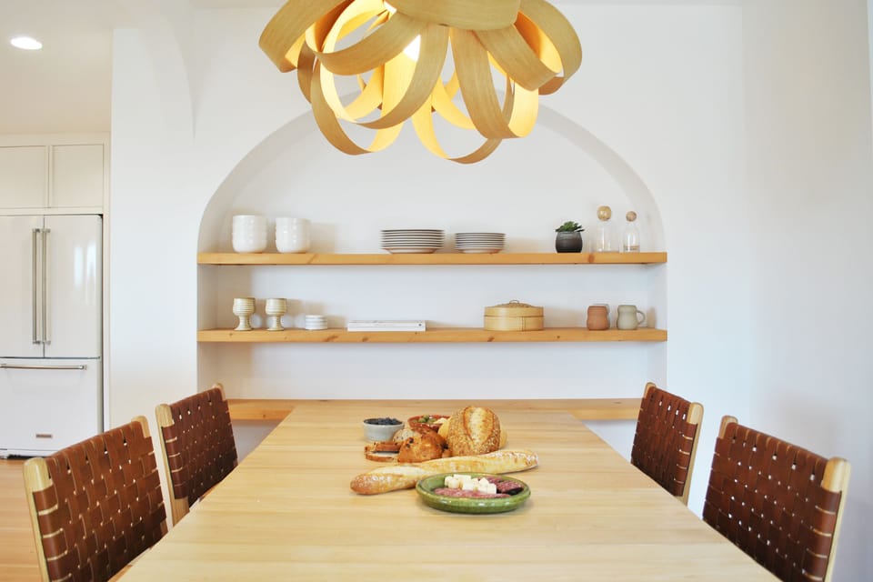 Enjoy a wonderful meal around the dining table.