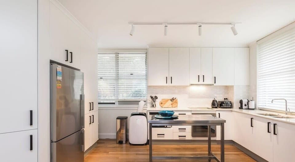 Full kitchen complete with dishwasher and large family size refrigerator