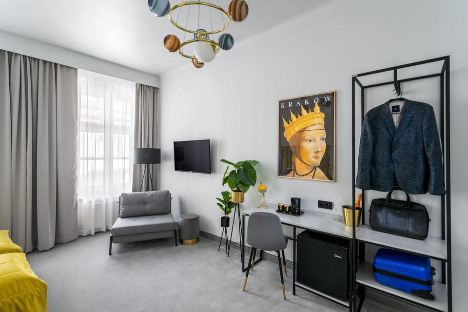 Premium Triple Room | Living area | 43-inch Smart TV with digital channels, TV