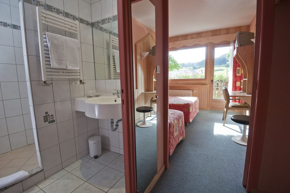 Shower, hair dryer, bathrobes, towels