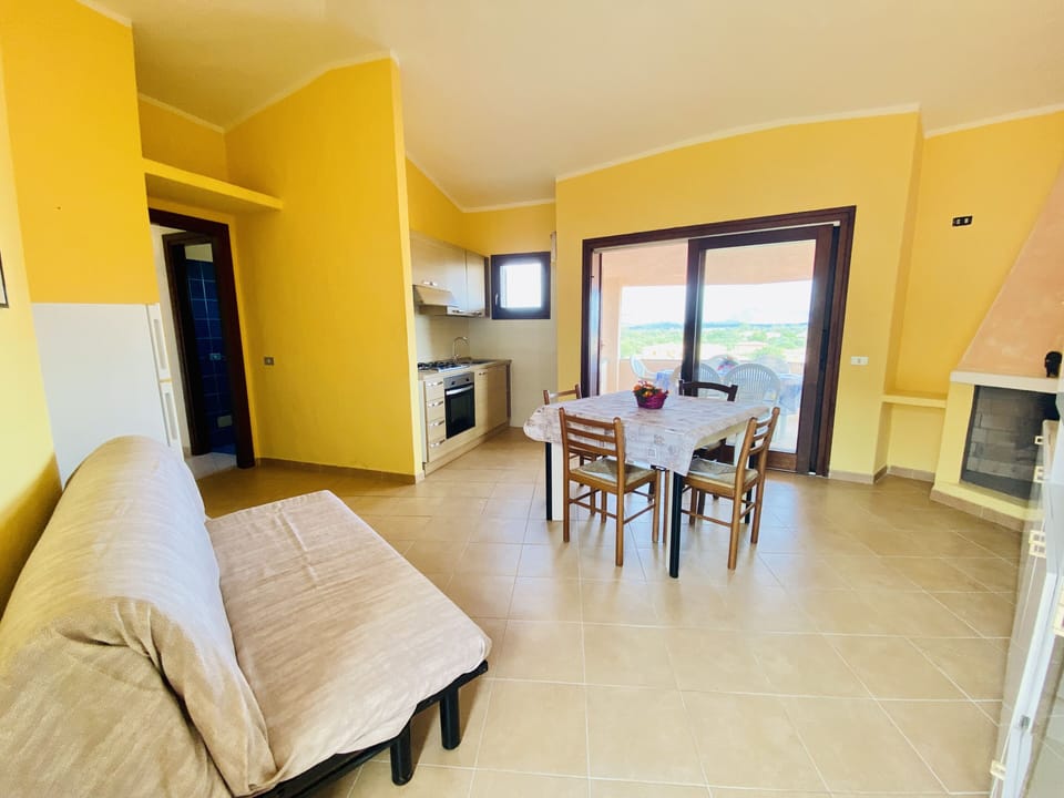 Apartment | Living area | 22-inch flat-screen TV with cable channels, TV