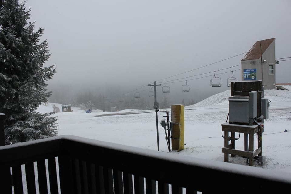 Your Deck - View from the back deck slopeside down skidder slope and sky stage