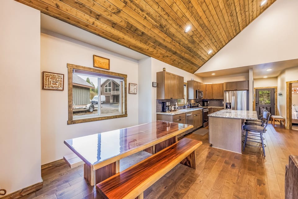 Rustic Live Edge Dining Table that seats up to 8 plus 3 Bars Stools