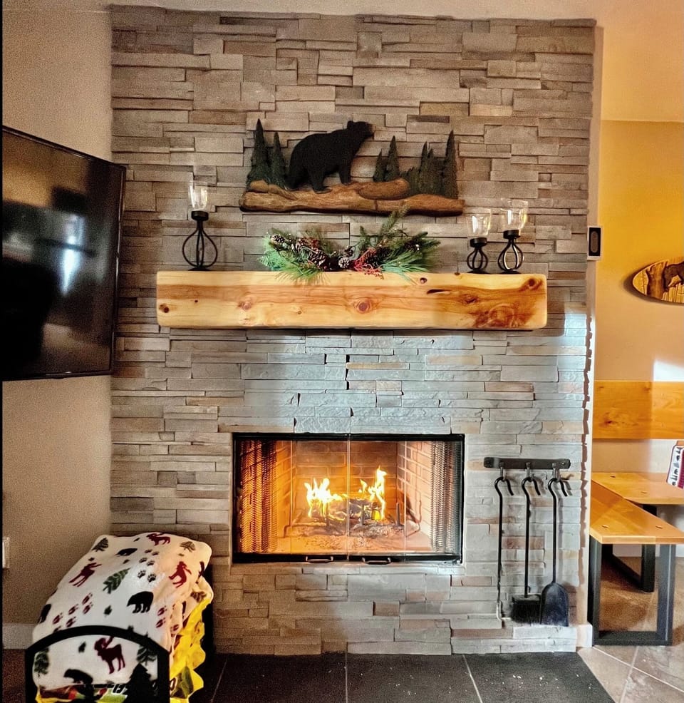 Cozy fireplace in the living room adds a wonderful atmosphere to your stay.