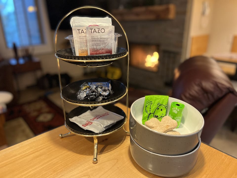 Assorted tea, hot chocolate -incl non-dairy- and pet necessities for Rover!