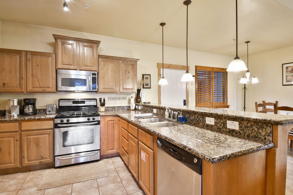 Enjoy additional seating at the kitchen bar, ideal for casual dining or chatting while meals are being prepared.