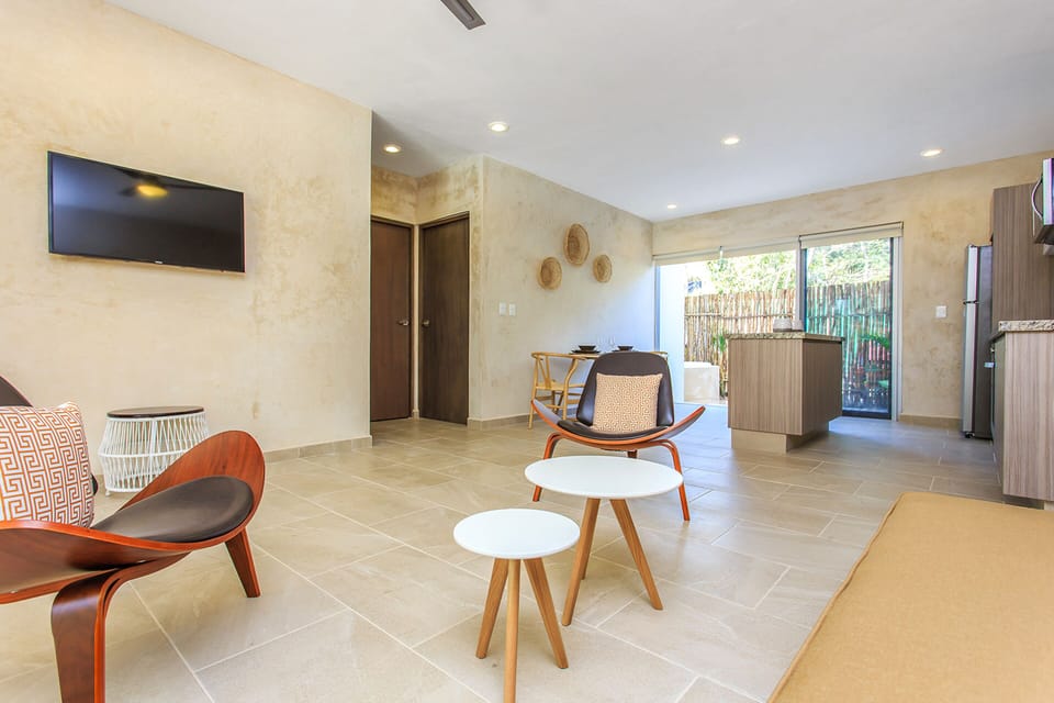 Honeymoon Apartment, 1 Bedroom, Balcony, Pool View | Living area | Flat-screen TV