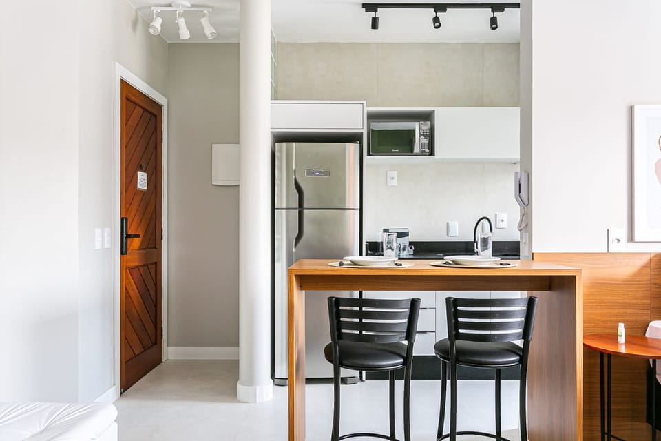 Full-size fridge, microwave, coffee/tea maker, cookware/dishes/utensils