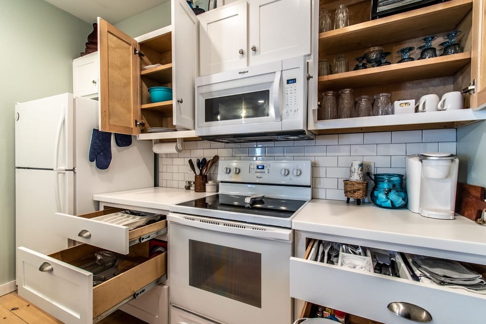 Kitchen featuring stocked kitchen
