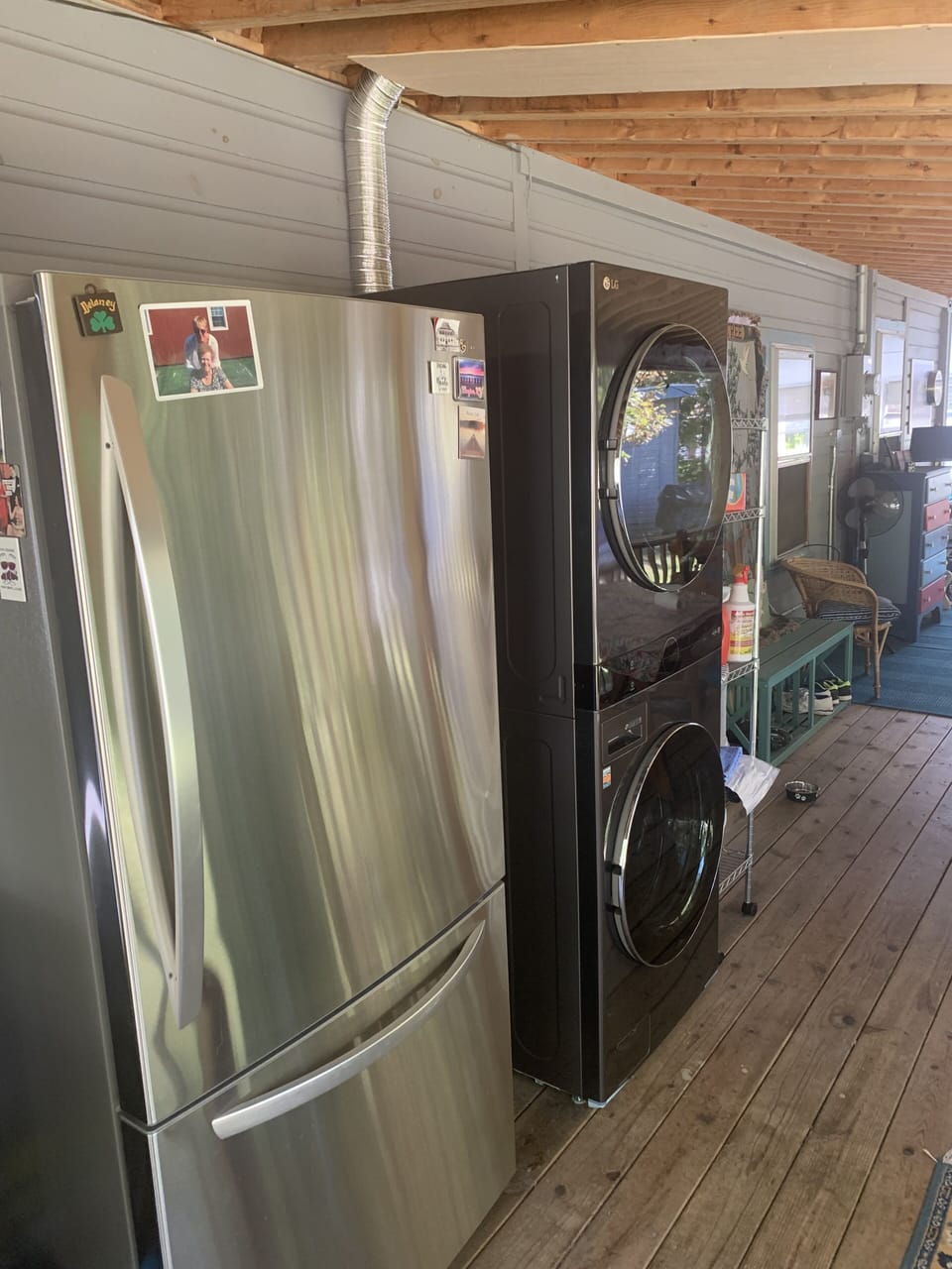 Full size refrigerator along with full size laundry tower.