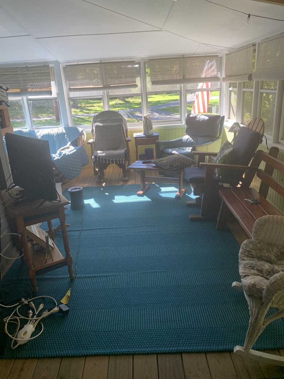 Spacious side porch offers ample seating!