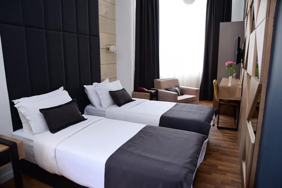 Deluxe Double or Twin Room | Minibar, desk, free WiFi, bed sheets
