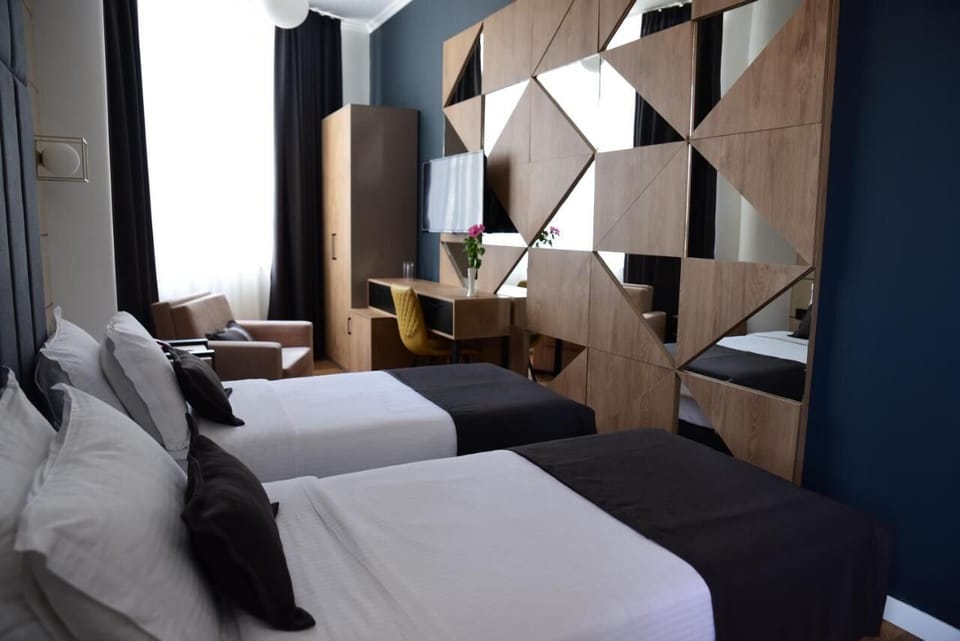 Deluxe Double or Twin Room | Minibar, desk, free WiFi, bed sheets