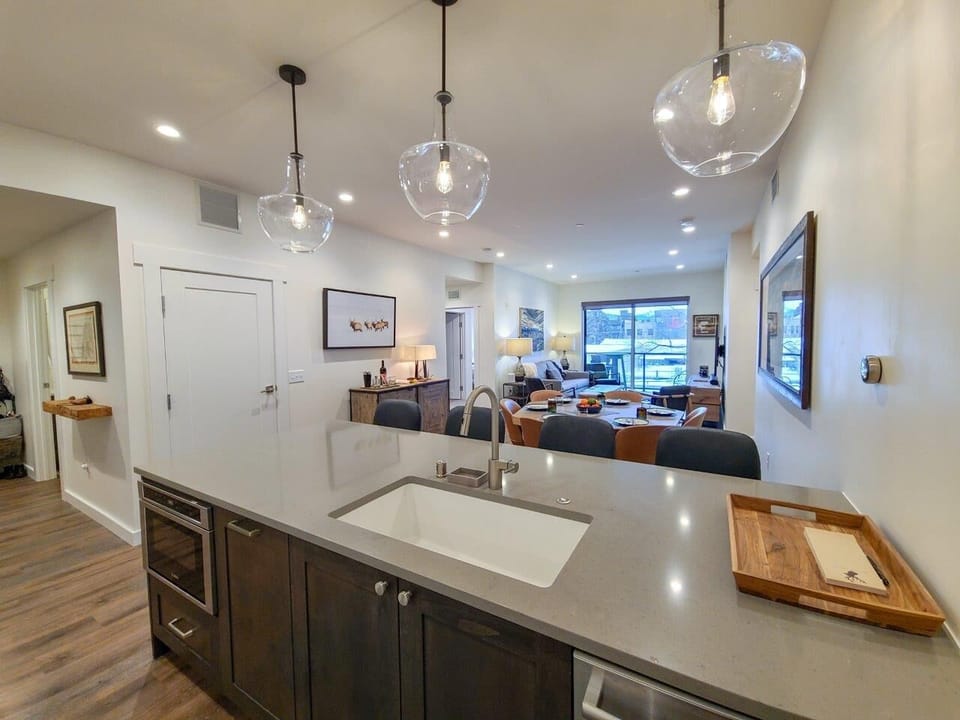 Kitchen is upon entering the home then leads to the dining and living area.