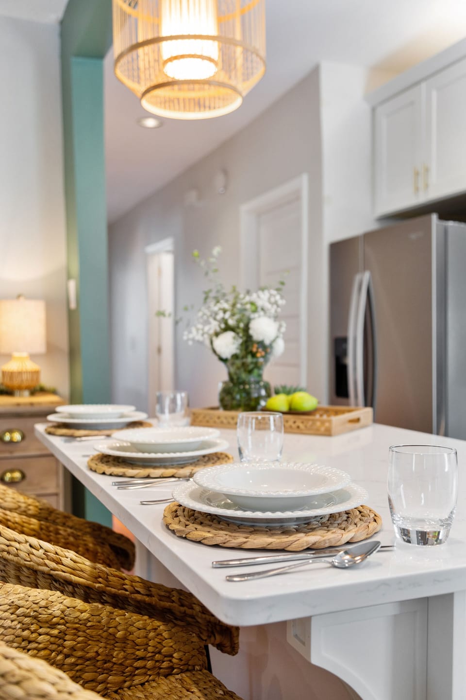 Fully stocked chef's kitchen opens to living room and balcony