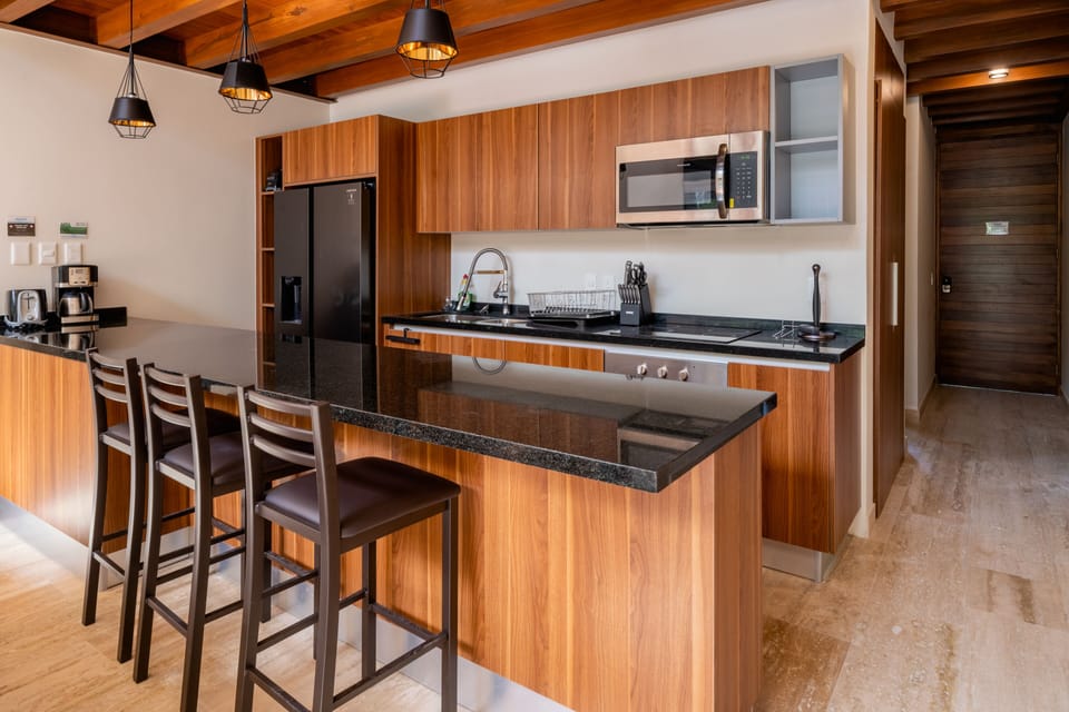 Luxury Condo | Private kitchen | Microwave, oven, toaster, blender