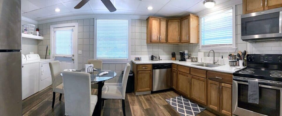 This is an overview of the kitchen, laundry, and dining!