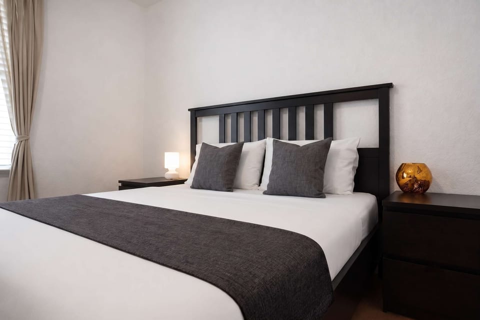 Wake up refreshed in this clean, modern Airbnb bedroom—perfect for peaceful mornings and restful nights.