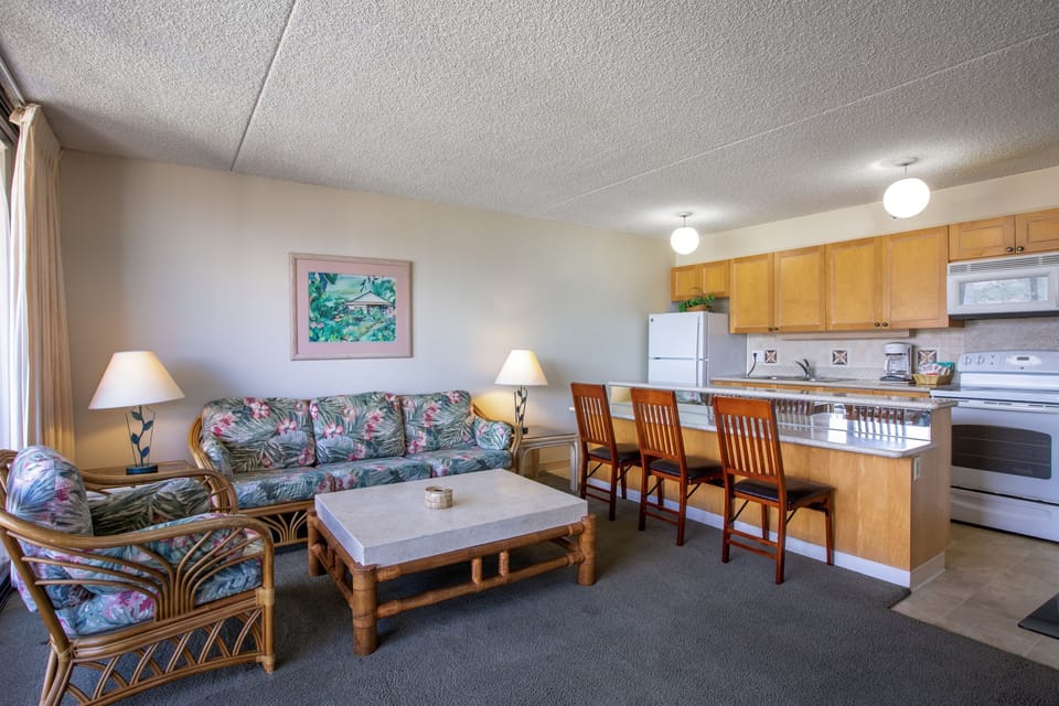 Settle into your spacious suite with a fully equipped kitchen, cozy seating, and everything you need to make yourself at home during your island escape.