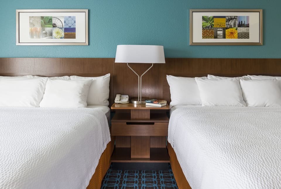Room, 2 Queen Beds | In-room safe, desk, iron/ironing board, cribs (free)