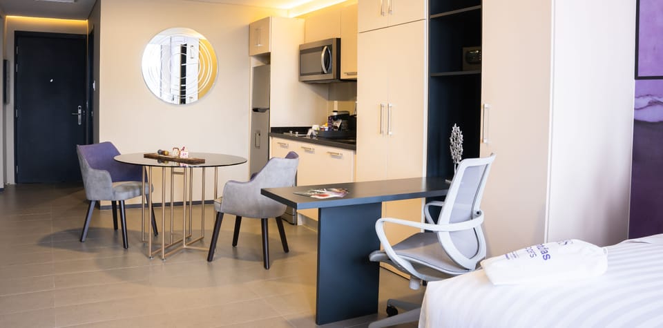 Junior Double Room | Private kitchen | Coffee/tea maker, full-size fridge, microwave, stovetop