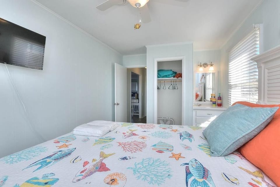 Pink and Blue Fish Queen Bedroom with Closet